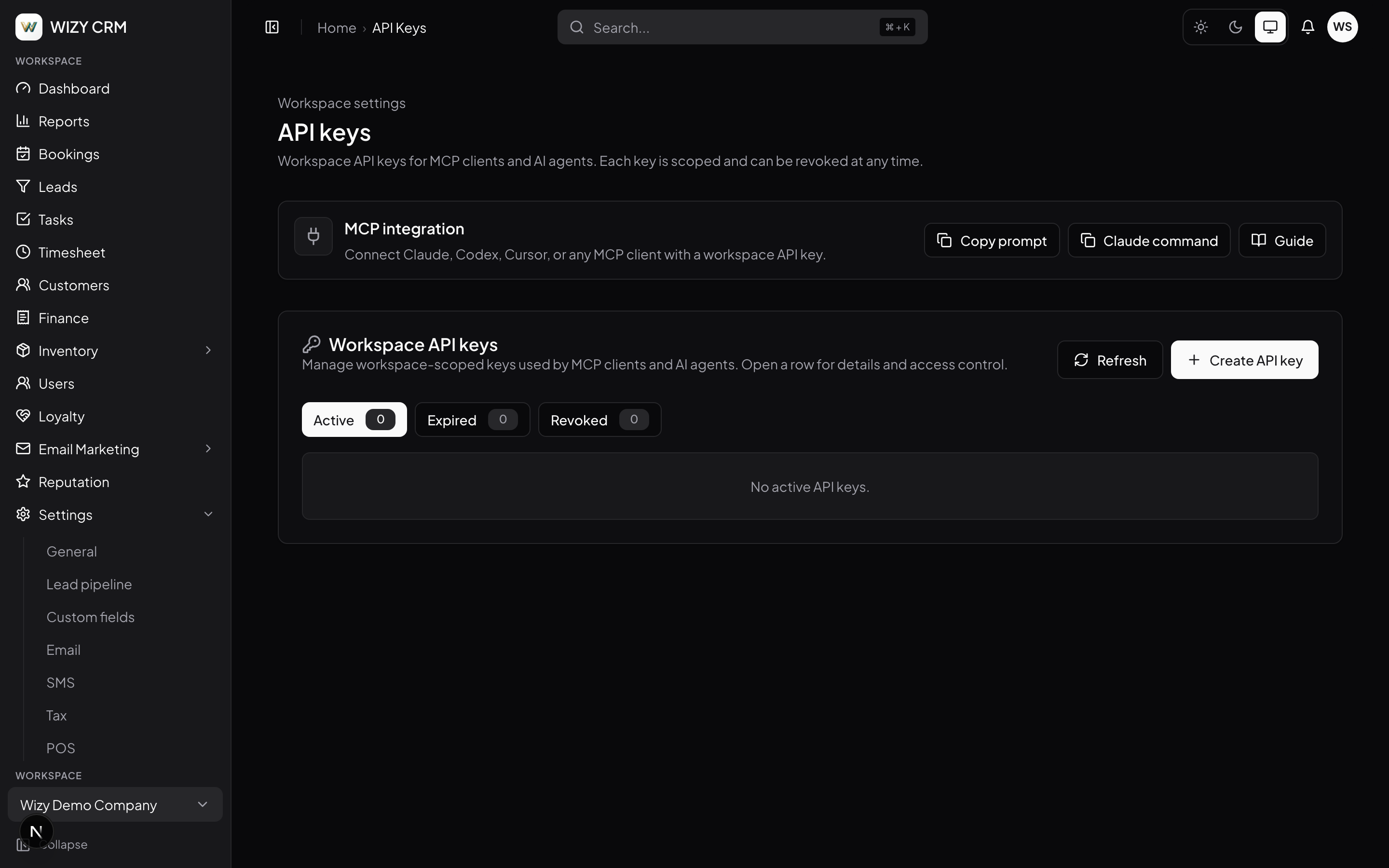 Màn hình API keys của Wizy CRM với panel MCP integration và danh sách workspace API key có phân quyền, thu hồi được, cùng các tab active, expired và revoked